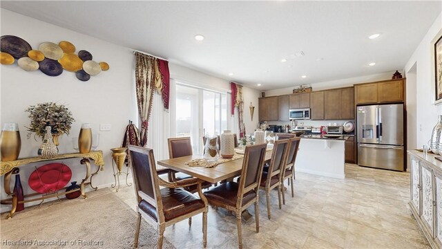 1076 Sugarwood St, Davenport, FL 33837 - dining room with recessed lighting