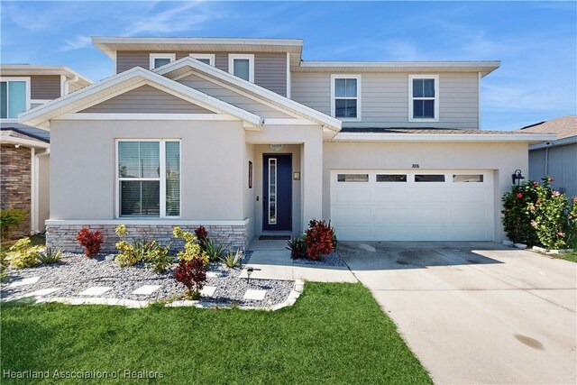 1076 Sugarwood St, Davenport, FL 33837 - view of front of house with driveway, a garage, and stucco siding