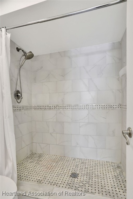 bathroom with a shower with curtain