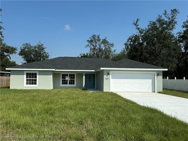 ranch-style home featuring a front lawn and a garage