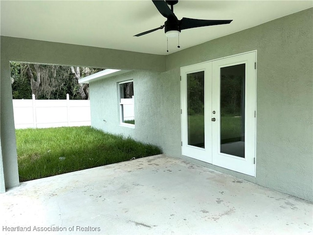 view of patio / terrace with ceiling fan and french doors