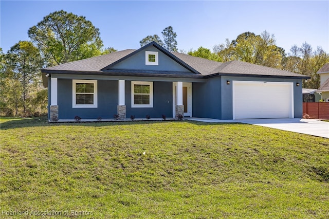 view of front of house with a shingled roof, stucco siding, a front lawn, concrete driveway, and a garage