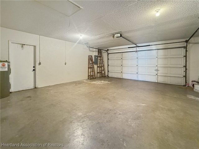 garage featuring electric panel, electric water heater, and a garage door opener