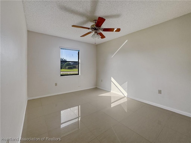 unfurnished room featuring a textured ceiling and ceiling fan