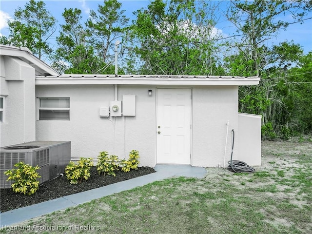 exterior space featuring cooling unit