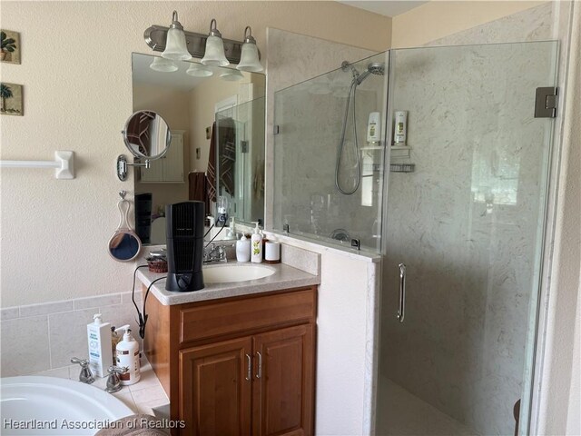 1502 Paper Birch St, Lake Placid, FL 33852 - full bath featuring a shower stall, vanity, and a bathtub