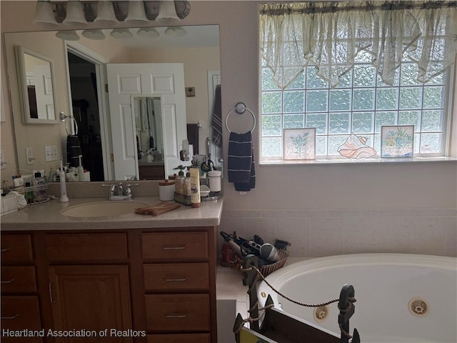 1502 Paper Birch St, Lake Placid, FL 33852 - bathroom with a whirlpool tub and vanity