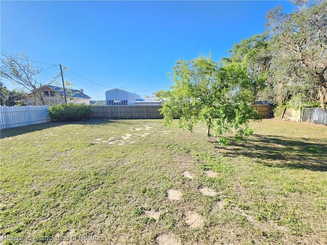 view of yard featuring a fenced backyard