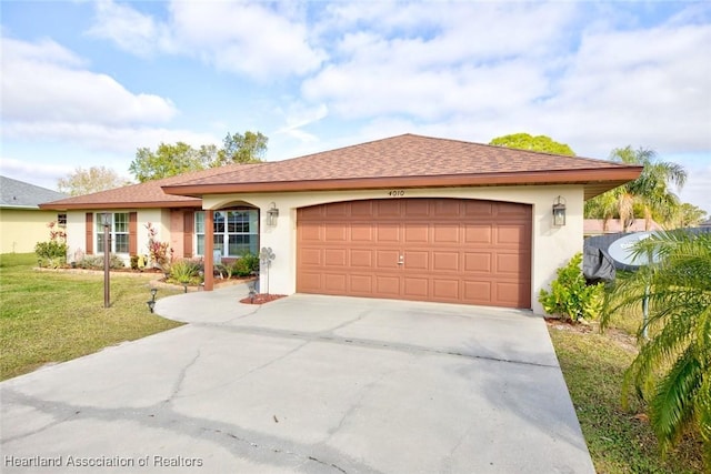 single story home featuring a garage and a front yard