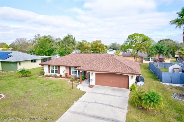 single story home with a garage and a front yard