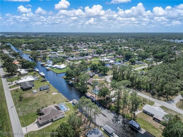 aerial view with a water view and a residential view