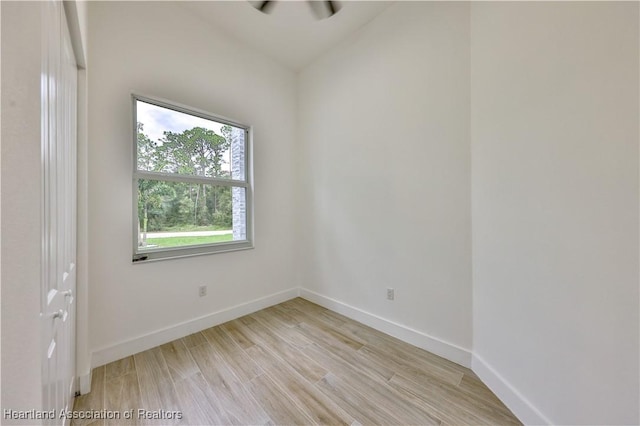 spare room with light wood-type flooring