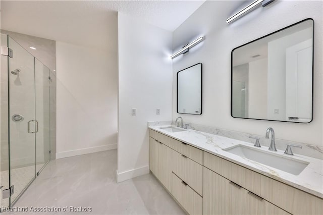 bathroom featuring vanity and walk in shower