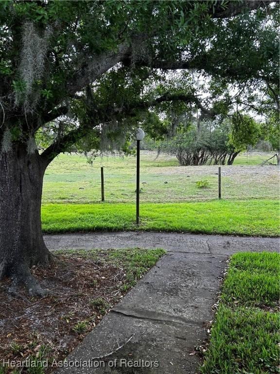 view of community featuring a yard