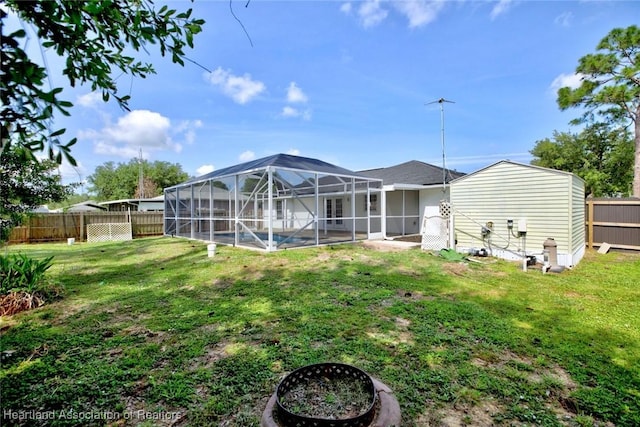 33064 Grand Prix Dr, Sebring, FL 33872 - rear view of house featuring a lanai and a pool