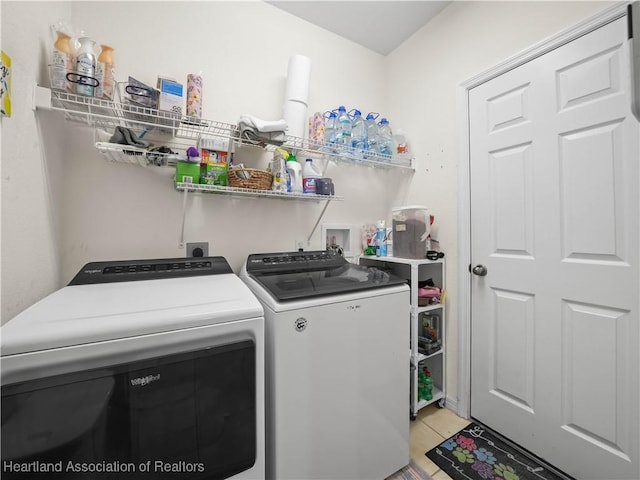 washroom with laundry area and independent washer and dryer