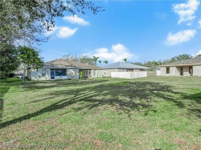 exterior space featuring fence