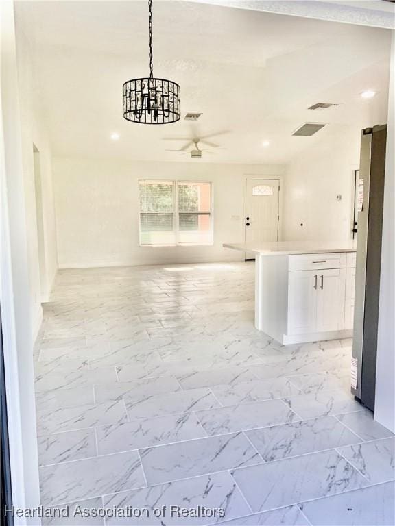 interior space with an inviting chandelier