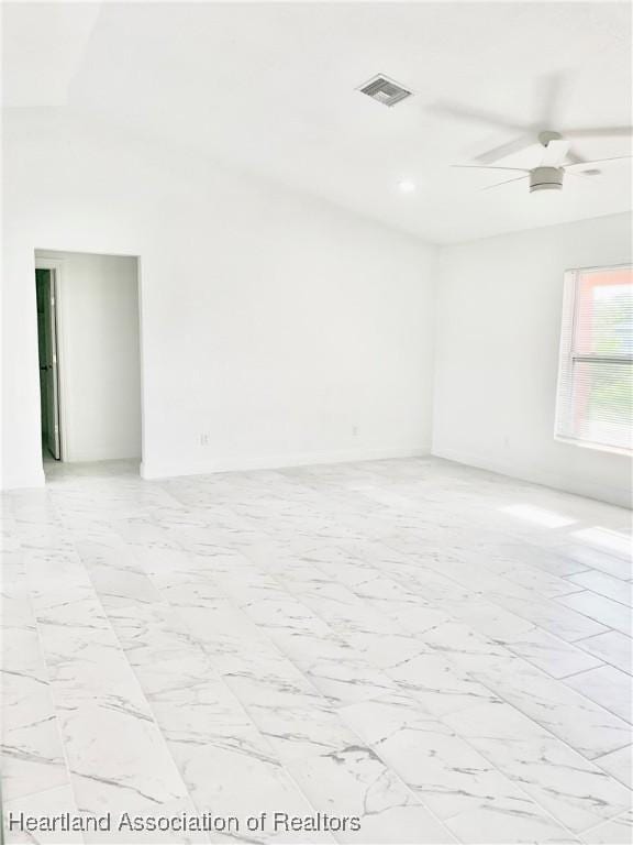 spare room featuring ceiling fan