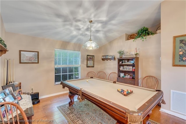 playroom with hardwood / wood-style flooring, vaulted ceiling, and pool table