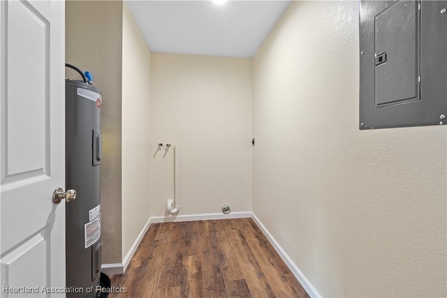 1100 Redbird St, Lake Placid, FL 33852 - laundry room with electric water heater, electric panel, dark wood-style flooring, baseboards, and hookup for an electric dryer