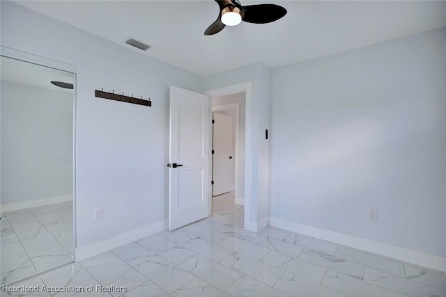 unfurnished room featuring ceiling fan