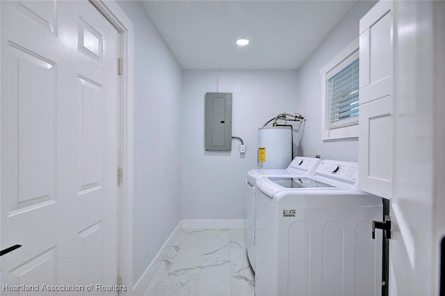 laundry room featuring gas water heater, electric panel, and washing machine and clothes dryer