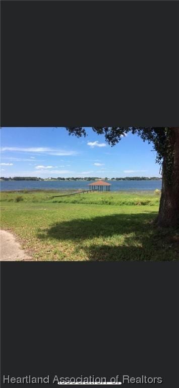 view of yard with a water view