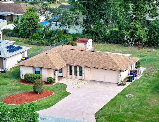 232 Dove Ave, Sebring, FL 33870 - view of front facade with a garage, a shingled roof, stucco siding, and concrete driveway