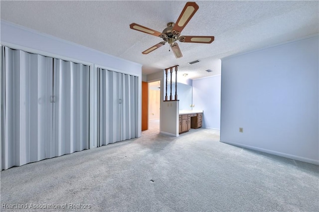 232 Dove Ave, Sebring, FL 33870 - carpeted empty room featuring a textured ceiling and ceiling fan