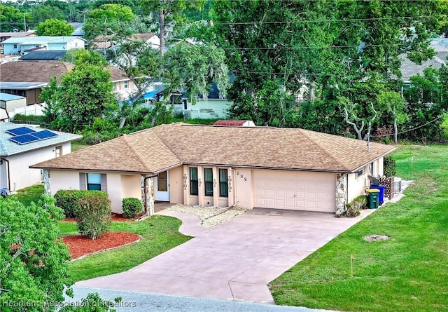 232 Dove Ave, Sebring, FL 33870 - ranch-style home featuring a garage, stucco siding, driveway, a front lawn, and a shingled roof
