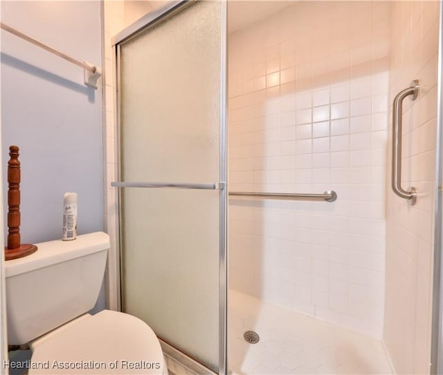 232 Dove Ave, Sebring, FL 33870 - bathroom with a stall shower and toilet