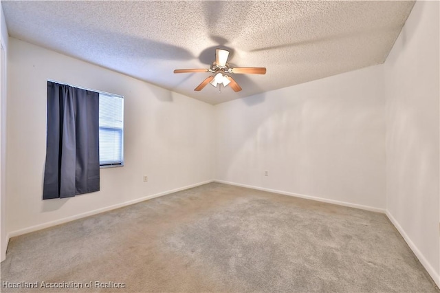 232 Dove Ave, Sebring, FL 33870 - unfurnished room with carpet floors, ceiling fan, baseboards, and a textured ceiling