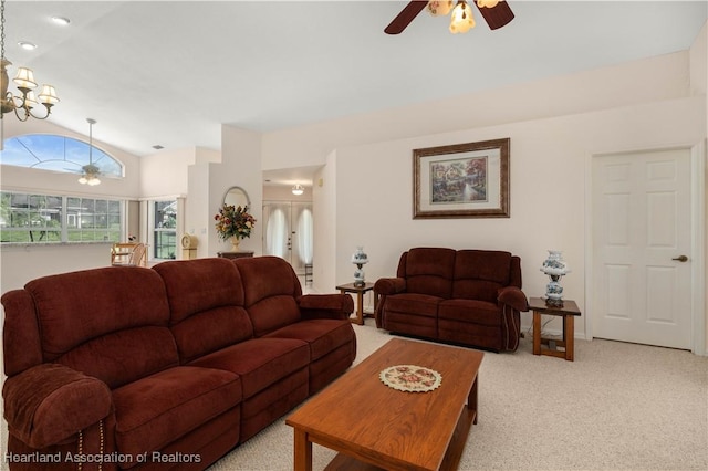 carpeted living room with ceiling fan, lofted ceiling, and french doors