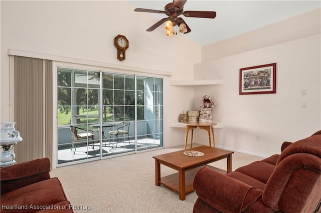 living room featuring carpet flooring and ceiling fan