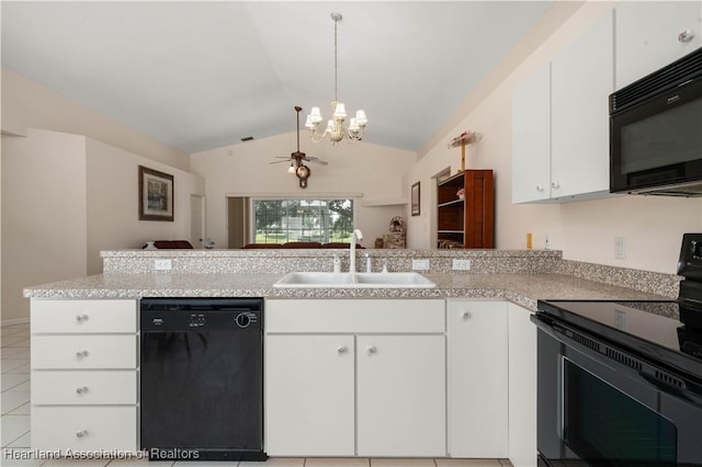 kitchen with kitchen peninsula, sink, white cabinets, and black appliances