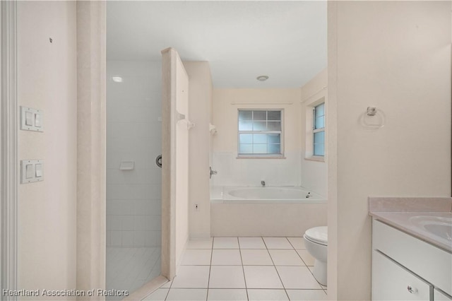 full bathroom featuring tile patterned flooring, vanity, toilet, and shower with separate bathtub