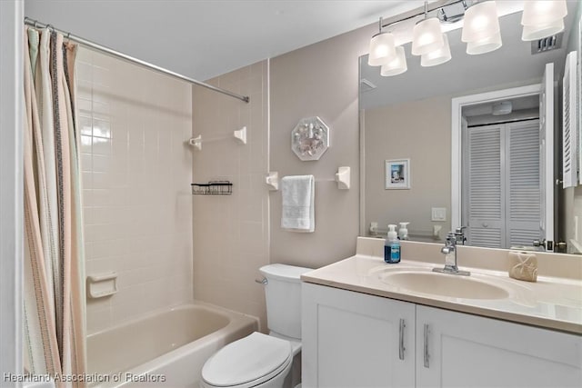 full bathroom with vanity, toilet, and shower / bathtub combination with curtain