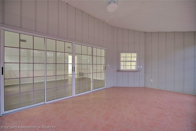 unfurnished room featuring ceiling fan