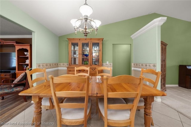 4023 Santa Barbara Dr, Sebring, FL 33875 - tiled dining space with vaulted ceiling and a chandelier