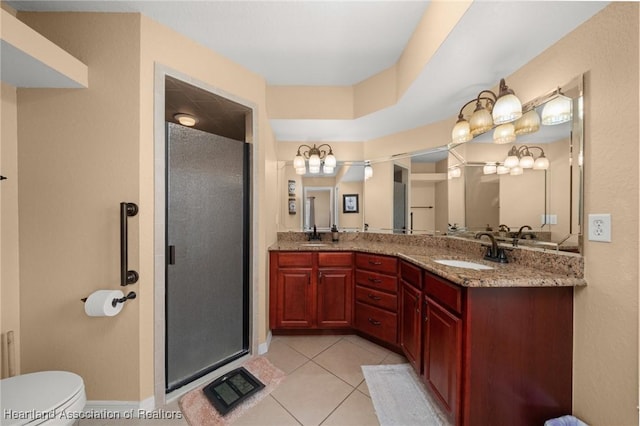 4023 Santa Barbara Dr, Sebring, FL 33875 - bathroom featuring double vanity, a shower stall, tile patterned floors, and toilet