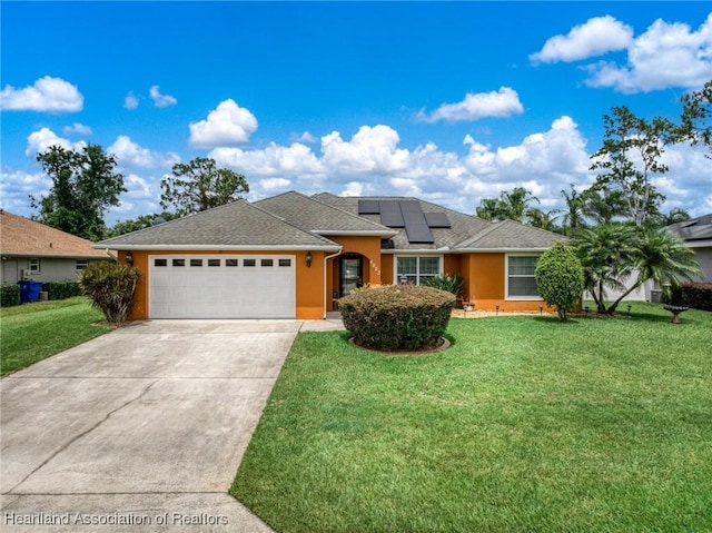 4023 Santa Barbara Dr, Sebring, FL 33875 - single story home with a garage, concrete driveway, a front yard, and solar panels