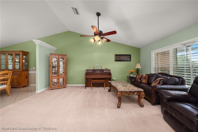 4023 Santa Barbara Dr, Sebring, FL 33875 - carpeted living room with ceiling fan, vaulted ceiling, and baseboards