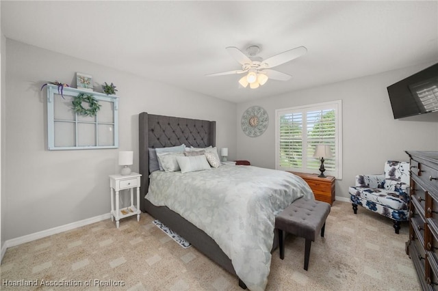 4023 Santa Barbara Dr, Sebring, FL 33875 - bedroom featuring light carpet, baseboards, and a ceiling fan