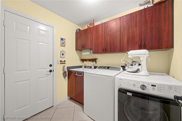 4023 Santa Barbara Dr, Sebring, FL 33875 - laundry room with cabinet space, washer and dryer, light tile patterned floors, and baseboards