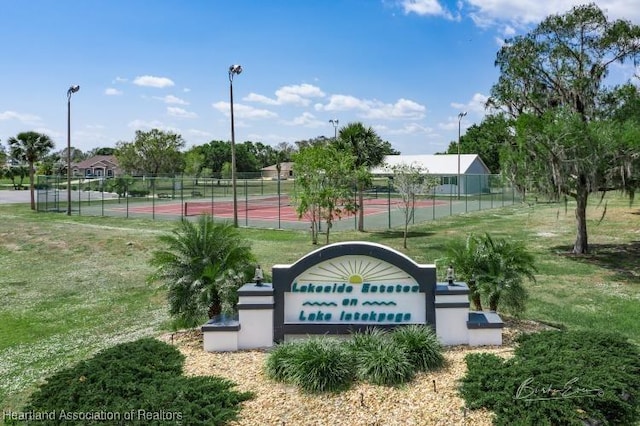 community sign with a lawn