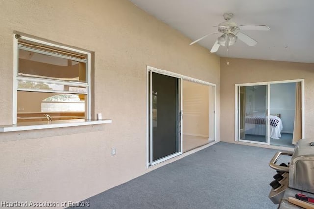 view of patio / terrace featuring ceiling fan