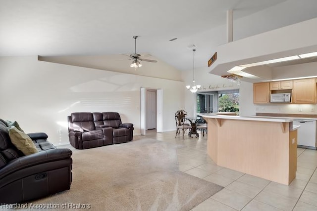 tiled living room featuring lofted ceiling and ceiling fan with notable chandelier