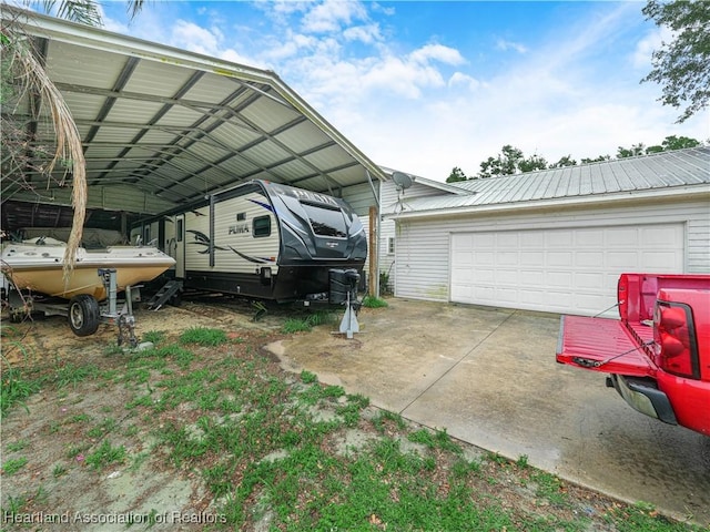 1494 Wilde St, Avon Park, FL 33825 - view of parking with a garage and a carport