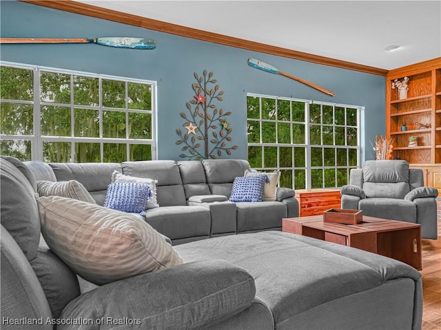 1494 Wilde St, Avon Park, FL 33825 - living area featuring crown molding and wood finished floors